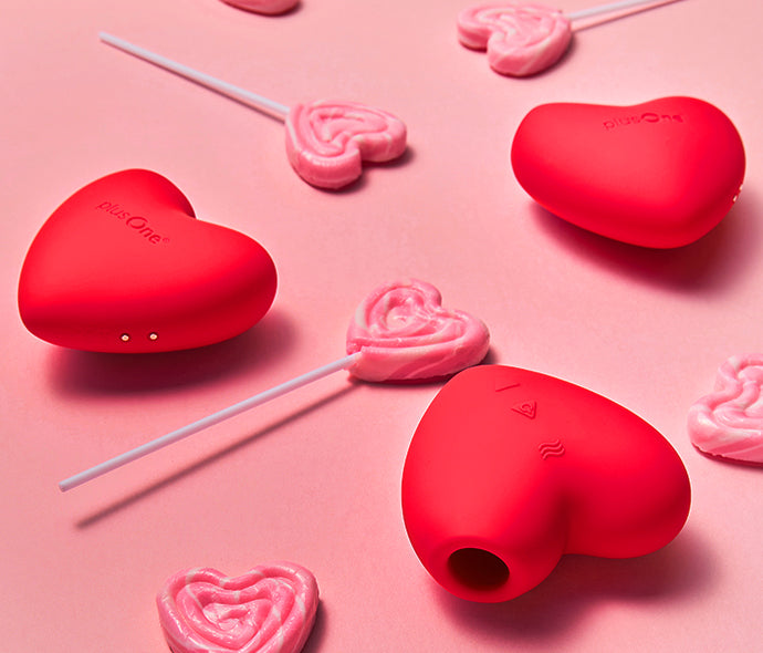 plusone throbbing heat with lollipops on a pink background