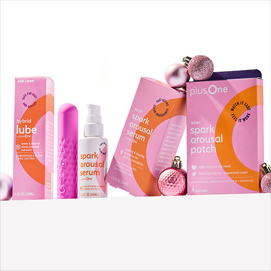Collection of Plus One brand products including a hybrid lube, serum, and patch on a white background.